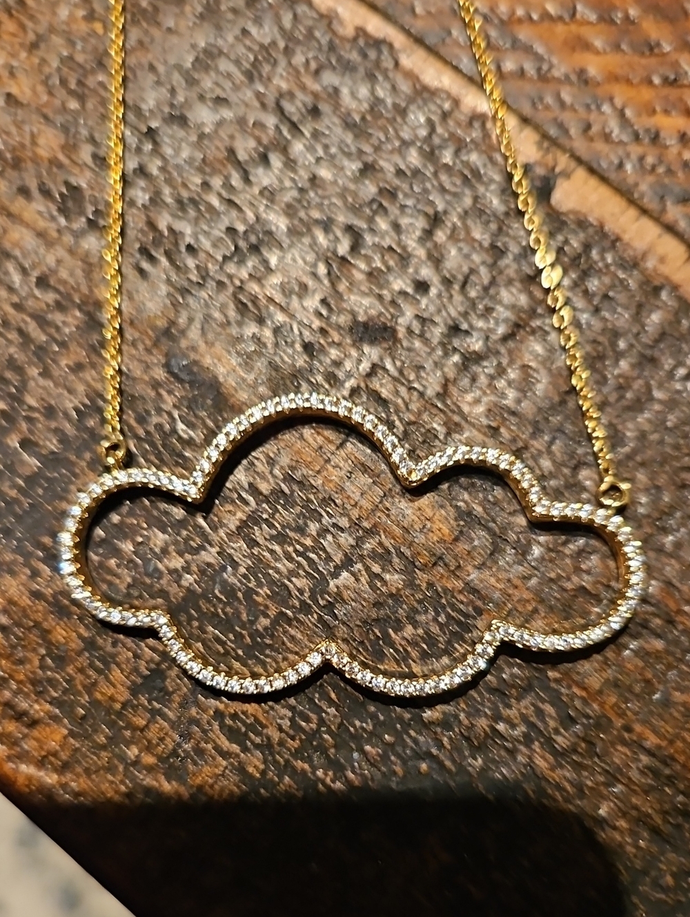 Gold tone Cloud Outline Necklace with Clear Crystals